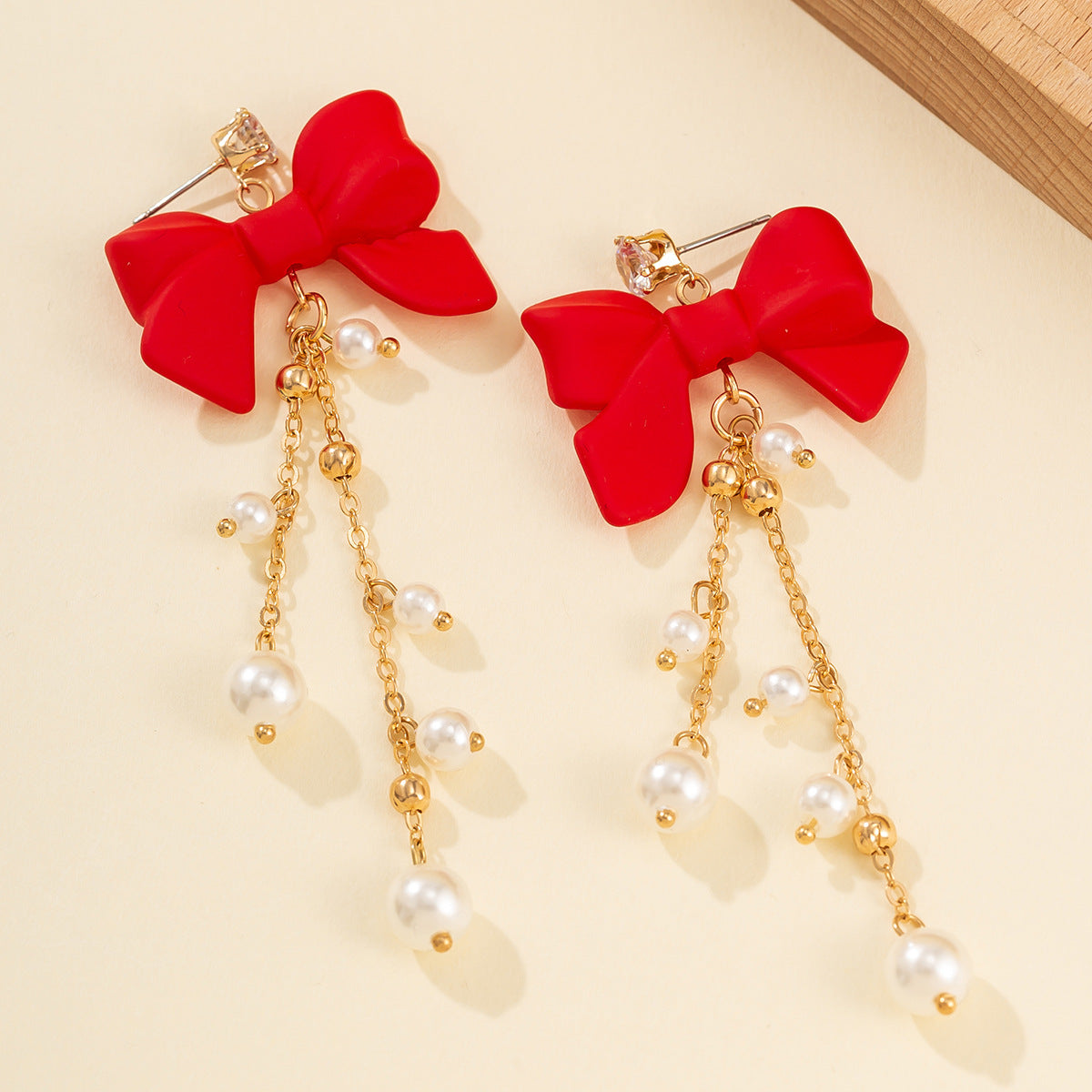 Pendientes de perlas de imitación en forma de lazo estilo Ins con borlas y detalles de cadena para mujer