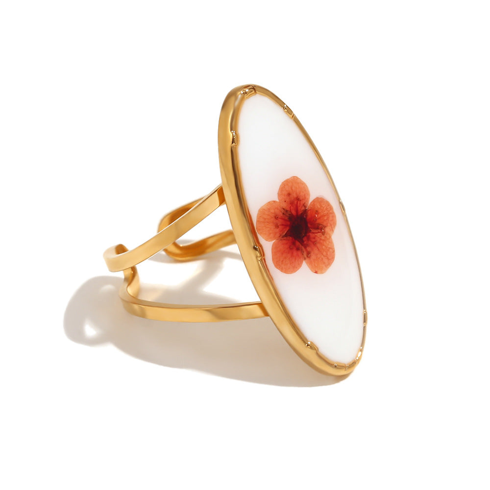 Anillo de acero inoxidable con textura martillada estilo vintage y baño de oro de 18 quilates, diseño floral de banda abierta ovalada para mujer