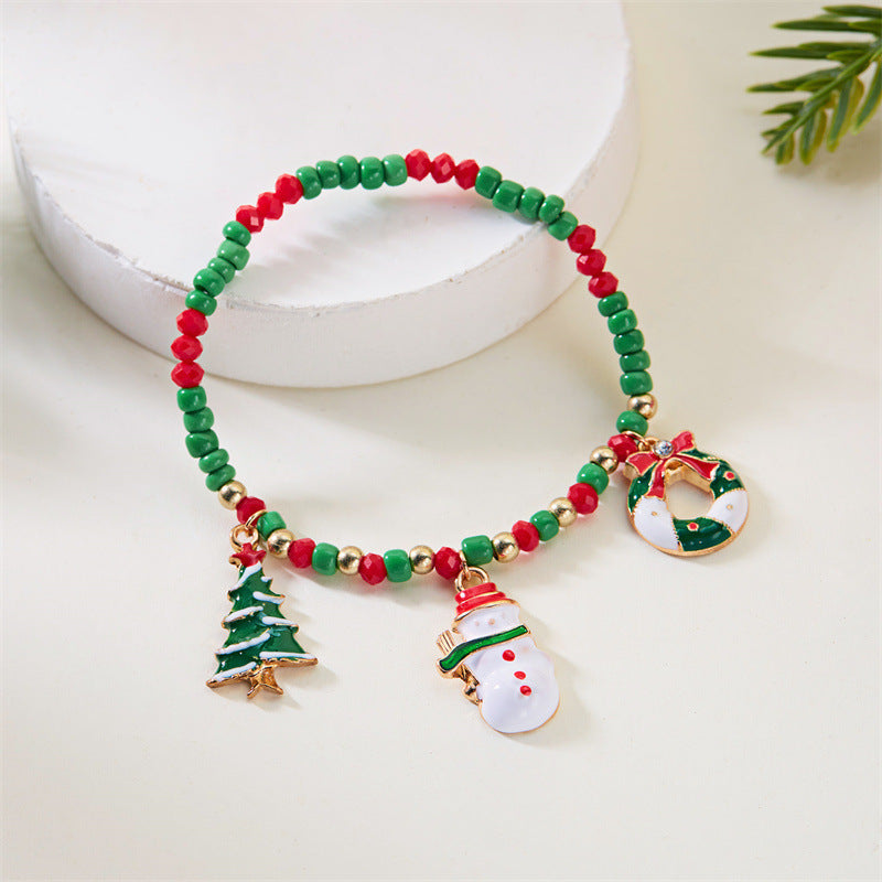 Bracciale natalizio alla moda da donna con ciondoli a forma di Babbo Natale e pupazzo di neve, design con perline, finitura galvanizzata, accessorio a tema festivo