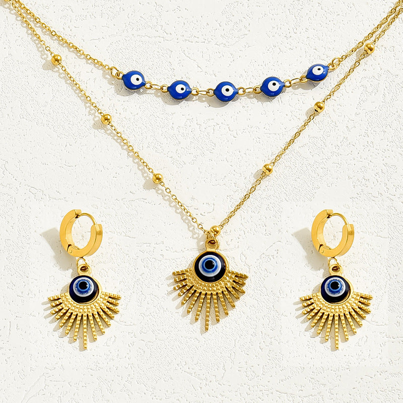 Collar y pendientes de ojo turco de estilo minimalista para viajeros en cobre con acabado esmaltado