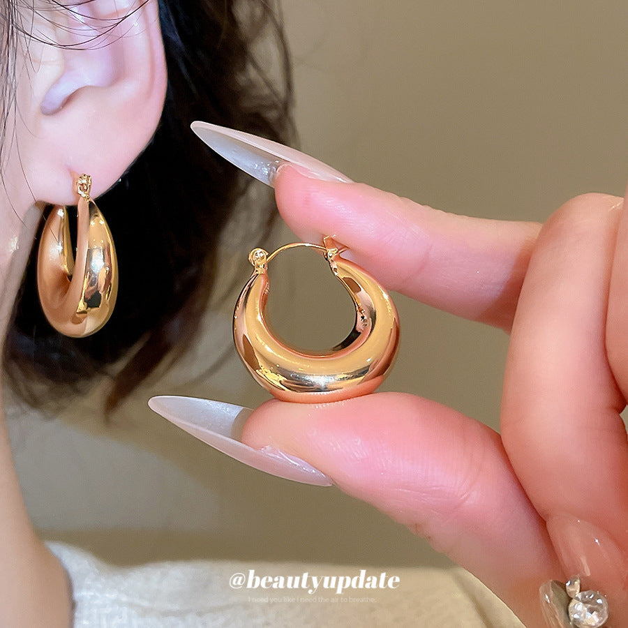 Pendientes de botón redondos geométricos minimalistas para mujer en metal chapado con acabado pulido elegante