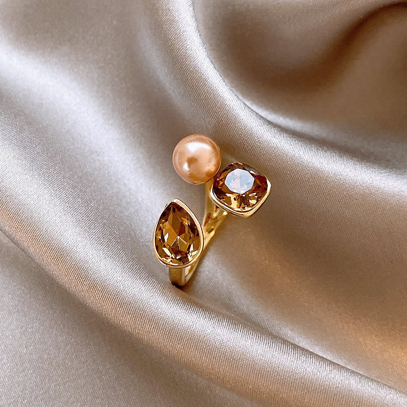 Anello da donna aperto a rombo a forma di fiore di iris in rame con intarsio di zirconi, ispirato al vintage
