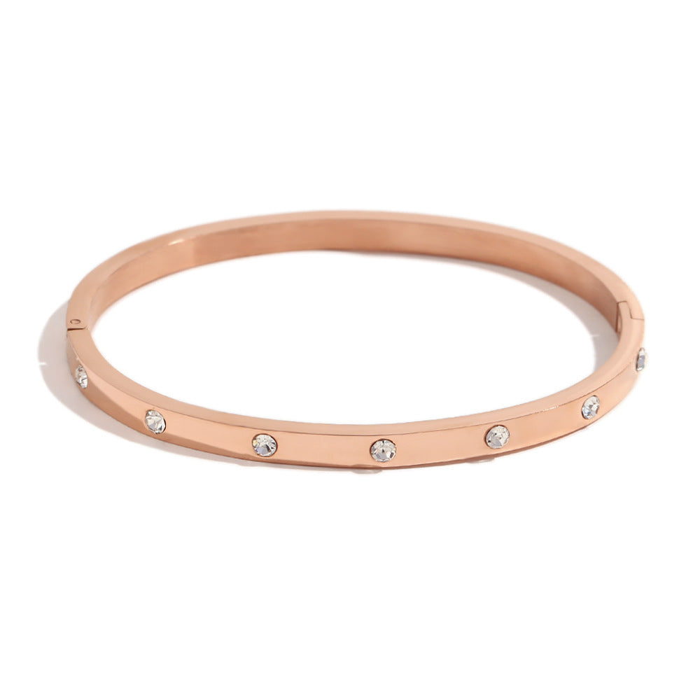 Bracciale Minimalista Geometrico in Acciaio Inossidabile con Placcatura in Oro 18K Finitura Oro Rosa e Accenti in Zirconia Rotonda