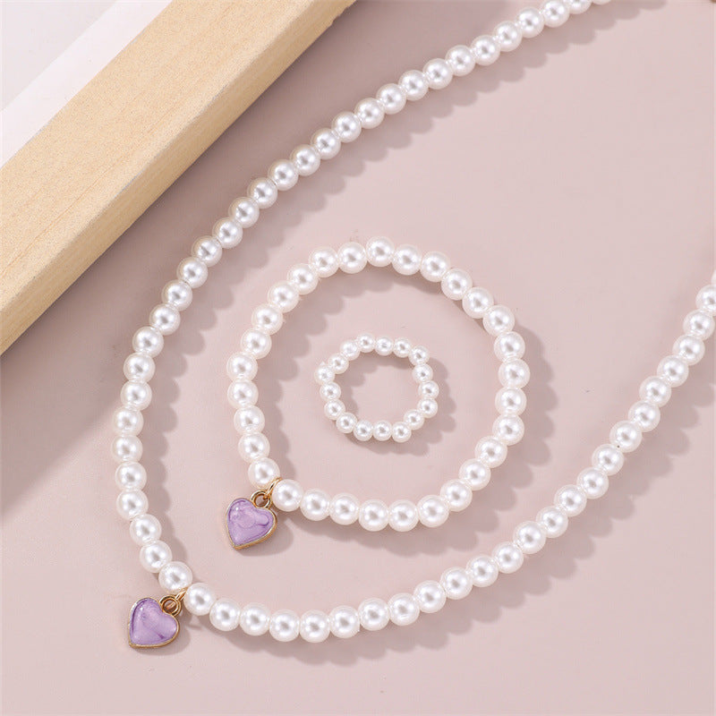 Juego de collar con colgante de aleación con forma de corazón para niñas, con cadena de perlas de agua dulce, para mayores de 6 años.