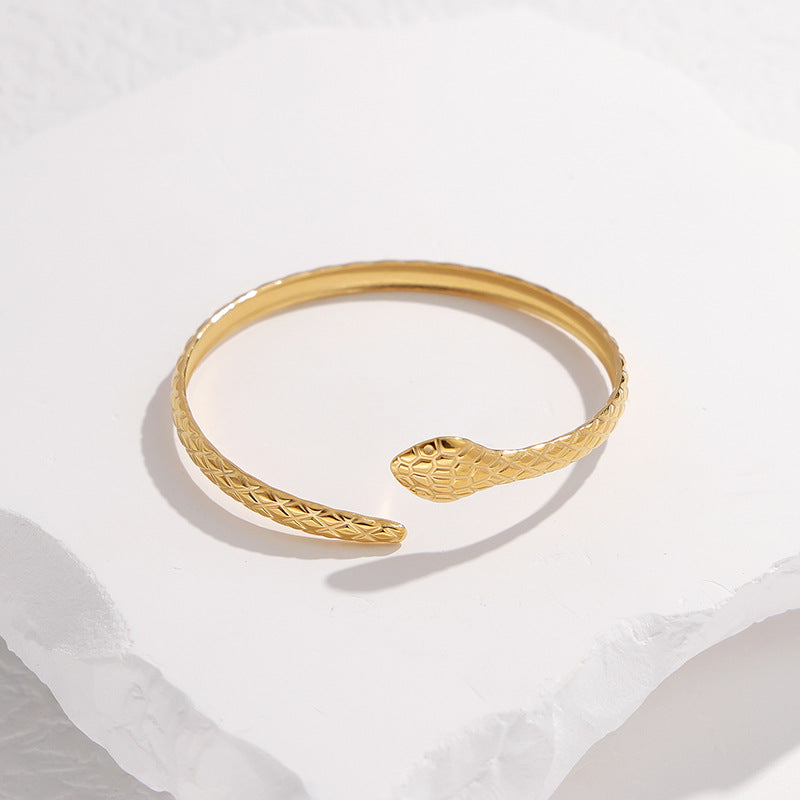 Pulsera ajustable de acero titanio con forma de serpiente para mujer, con acabado chapado, brazalete de metal estilo C a la moda