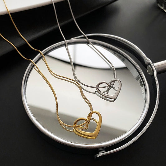Minimalist Hollow Heart Pendant Necklace for Women in Titanium Steel with Plated Finish, Delicate Clavicle Chain