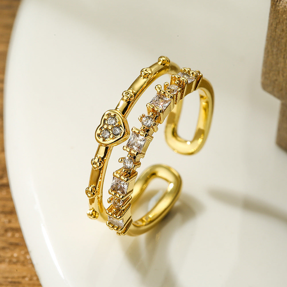 Anello da donna minimalista a forma di cuore geometrico in rame placcato oro con zirconi micro-pavé