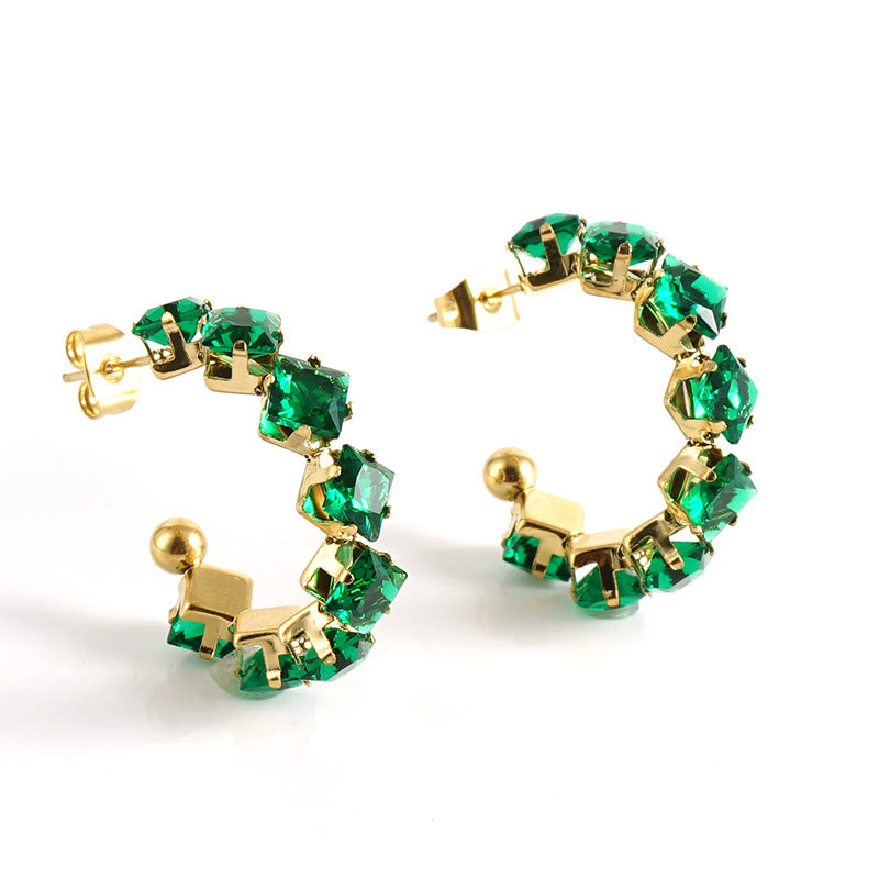 Orecchini a perno da donna alla moda geometrici in acciaio al titanio placcato oro 18K con zirconi