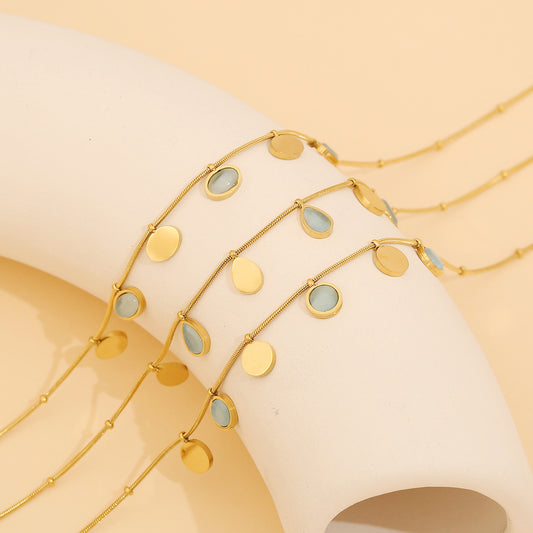 Elegante collar de piedra ojo de gato geométrica de acero inoxidable con acabado chapado, cadena de serpiente para mujer