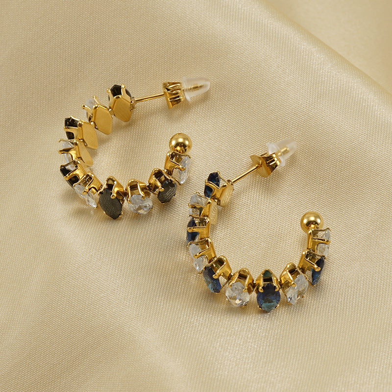 Orecchini a perno da donna alla moda geometrici in acciaio al titanio placcato oro 18K con zirconi
