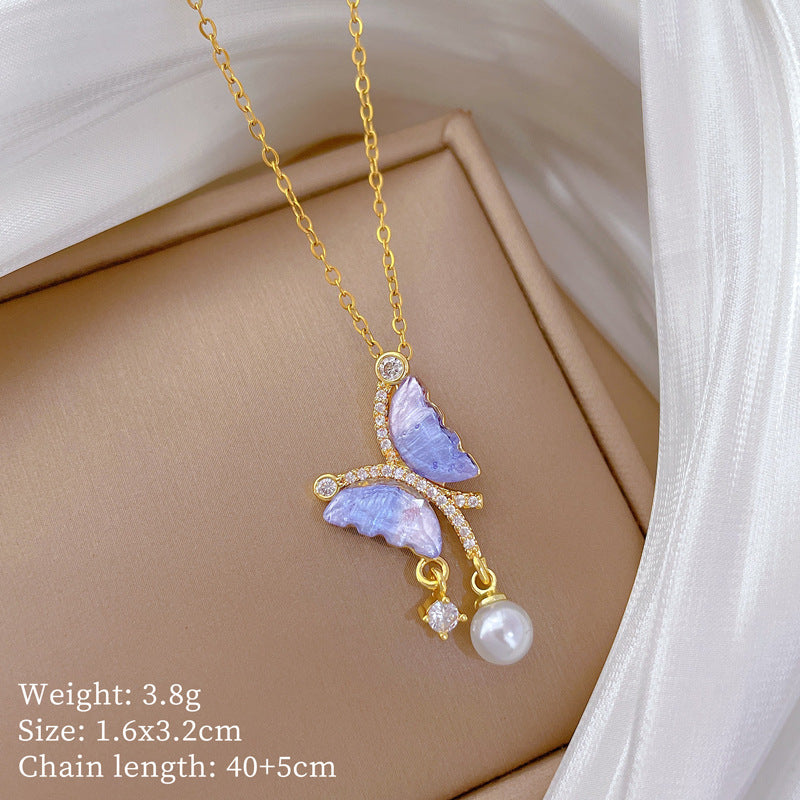 Collana da donna in acciaio inossidabile a forma di farfalla blu in stile cartone animato, con perle e strass