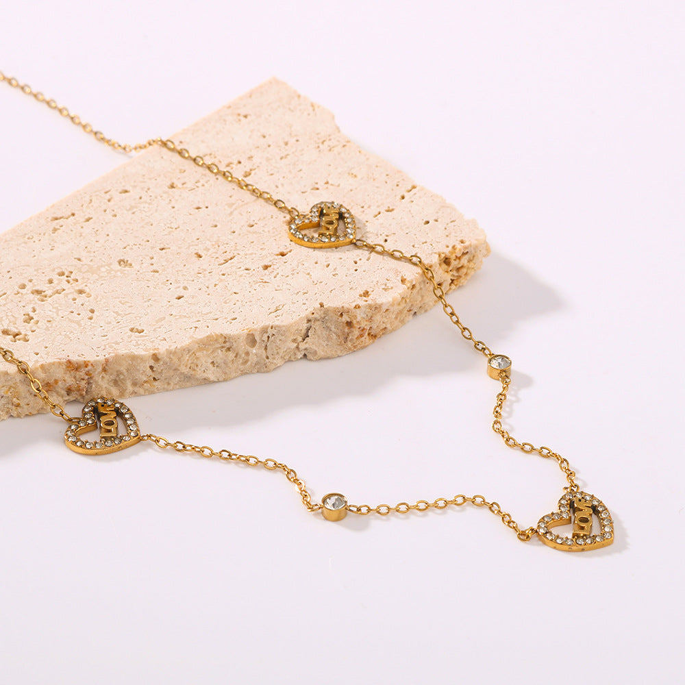 Collar colgante minimalista de corazón de amor en acero inoxidable con baño de oro de 18 quilates en cadena O para mujer