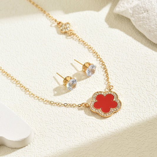 Set collana con ciondolo floreale stile Chanel con intarsio di strass per donna, catena lunga in lega e orecchini abbinati
