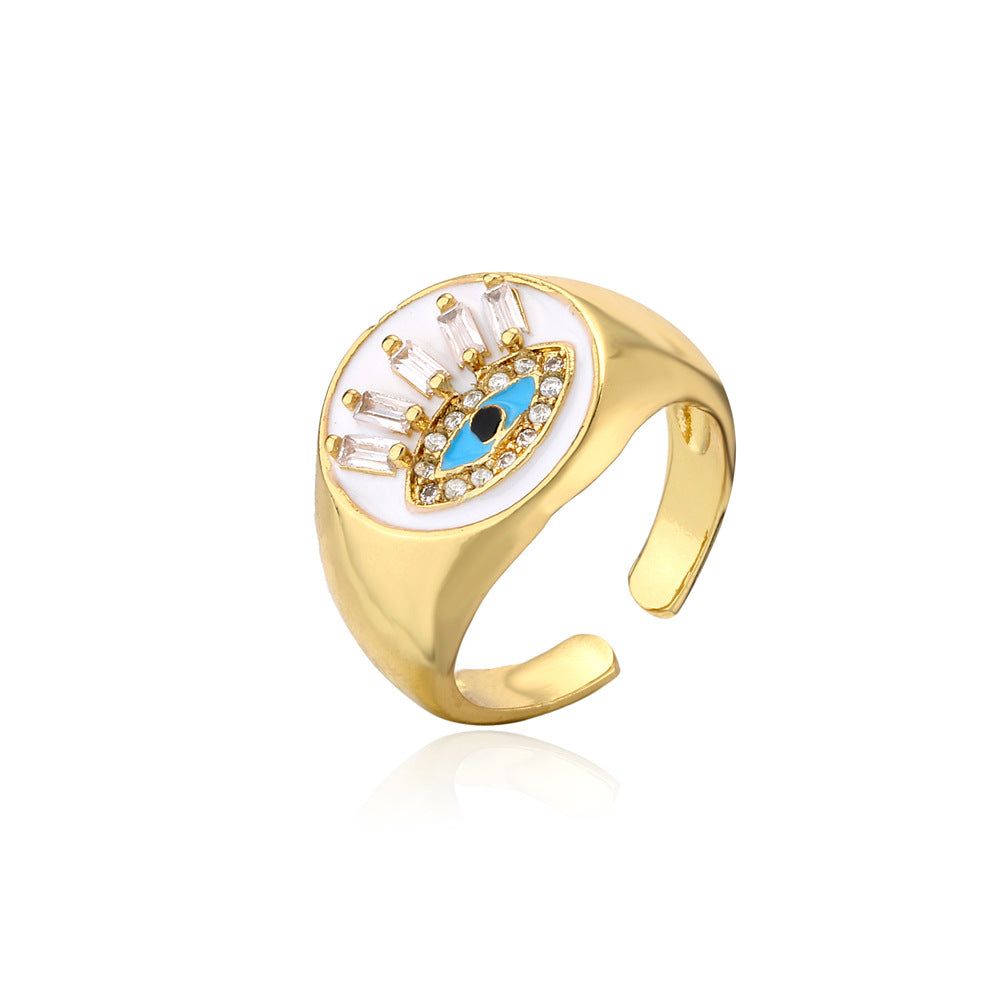 Geometric Brass Gold Plated Ring with Cubic Zirconia and Drip Oil Eye Design for Women