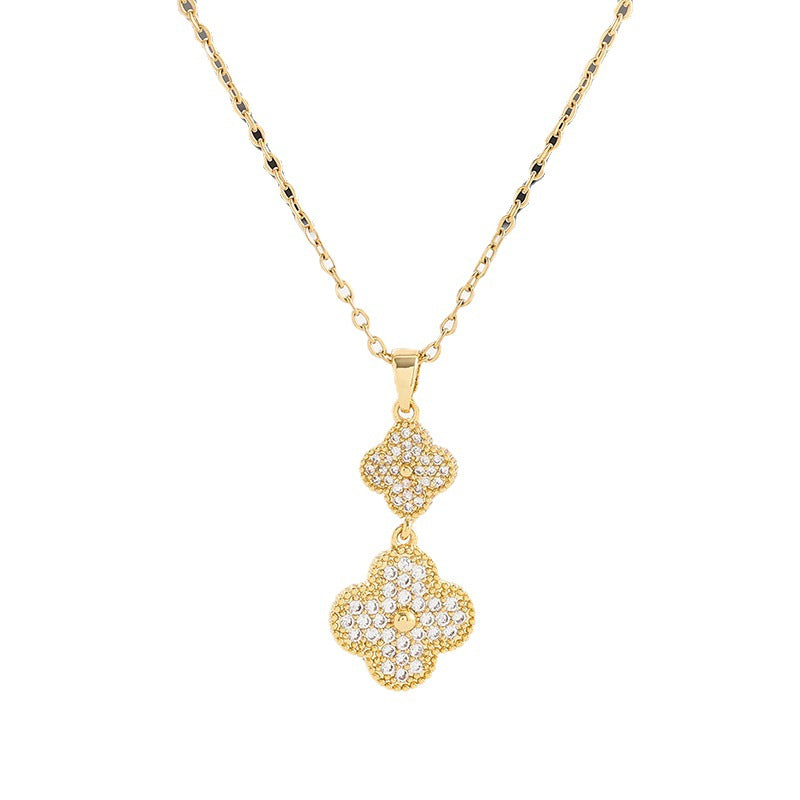 Collana da donna con ciondolo a trifoglio geometrico alla moda in zircone, placcato oro 18K su acciaio inossidabile, con catena a maglie.