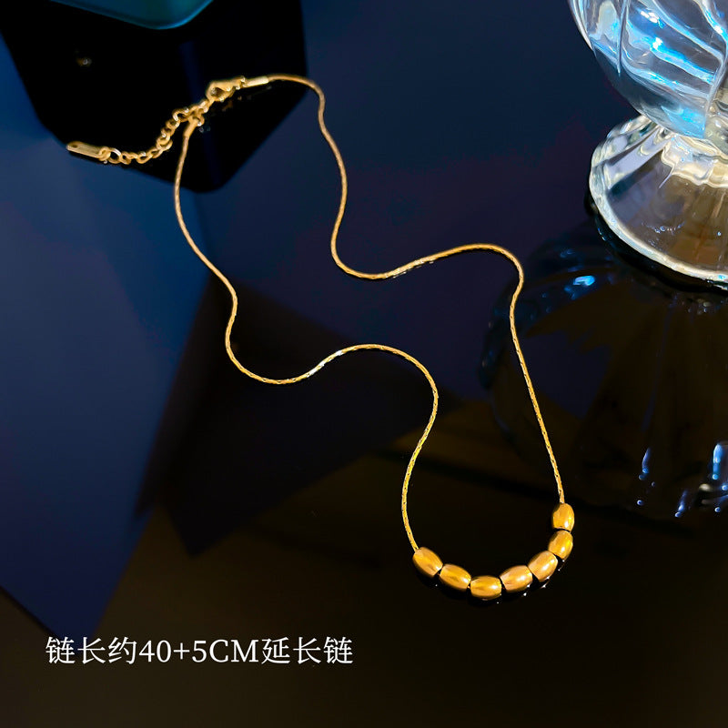 Collana Pendente Geometrica Minimalista da Donna in Acciaio al Titanio con Placcatura Oro e Design a Motivo Fagiolo