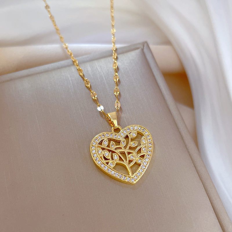 Luxury Titanium Steel Heart-Shaped Leaf Pendant Necklace for Women, Delicate Clavicle Chain with Plated Finish, Natural Theme Wedding and Party Jewelry