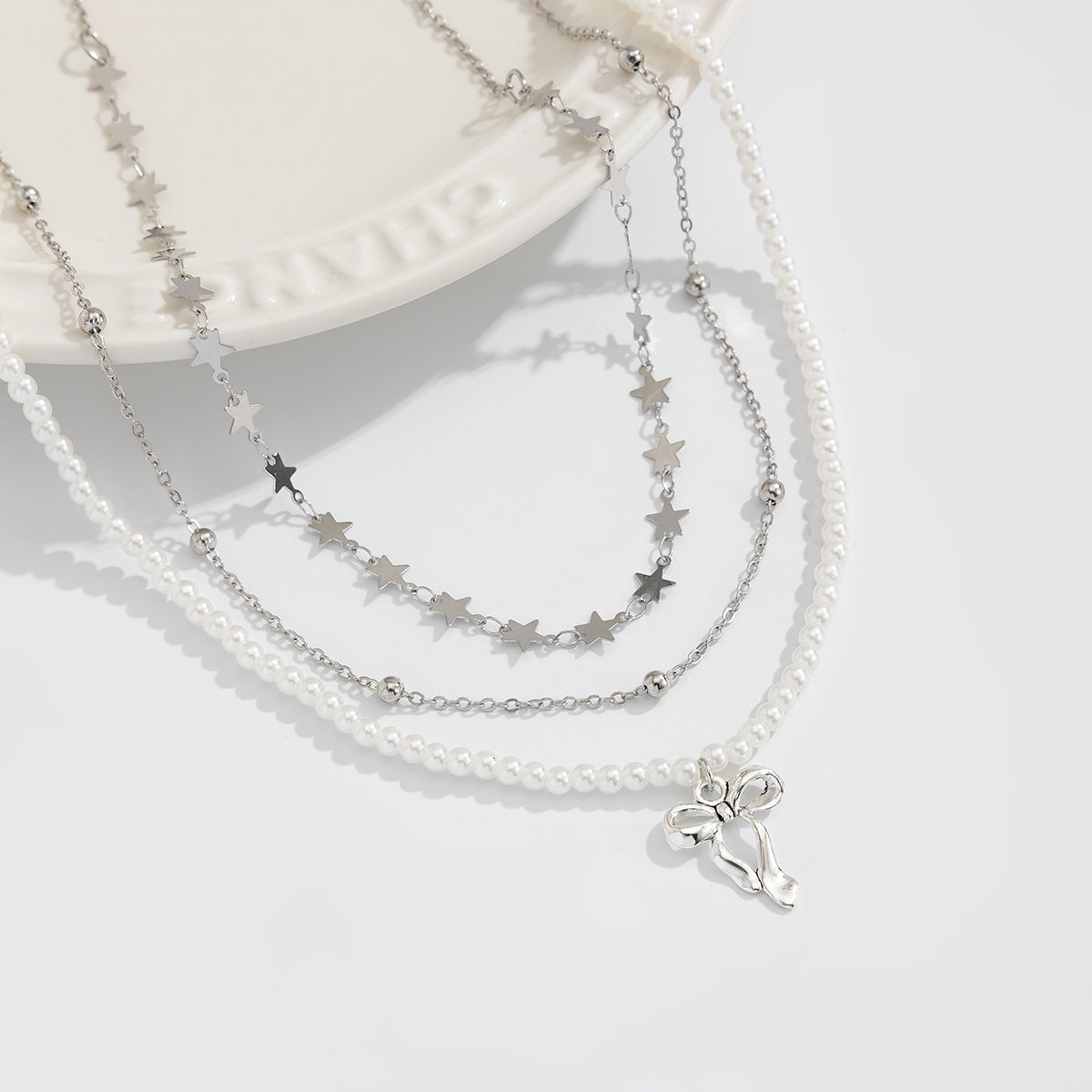 Set di collana con ciondolo a stella geometrico dolce e audace per donne con catena in rame e ciondolo in lega