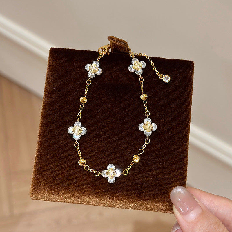 Elegante bracciale da donna regolabile in rame con zirconi a forma di fiore e stile minimalista di lusso