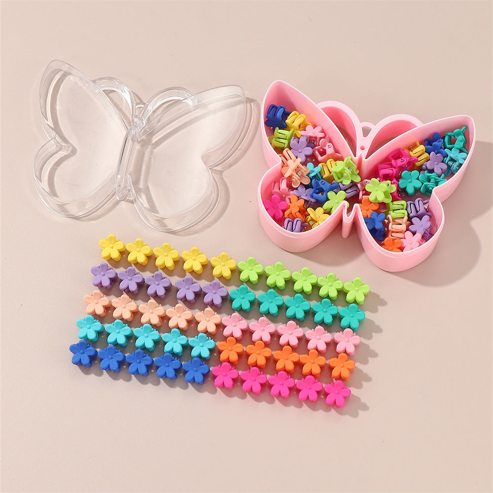 Fermaglio per capelli in plastica a forma di fiore per bambini con finitura smaltata in colori caramella