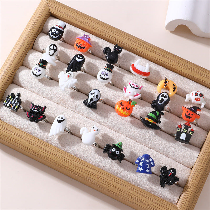 Juego de anillos infantiles con temática de Halloween, con diseños de calabaza, calavera y fantasma, anillos de plástico de resina para niñas de 6 a 10 años
