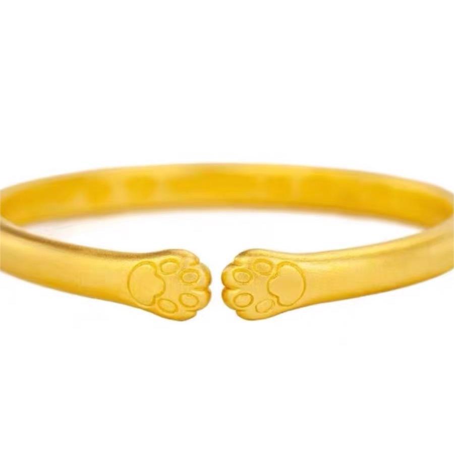 Bracciale a forma di zampa di gatto carino in rame placcato oro per donna con design delicato ed elegante