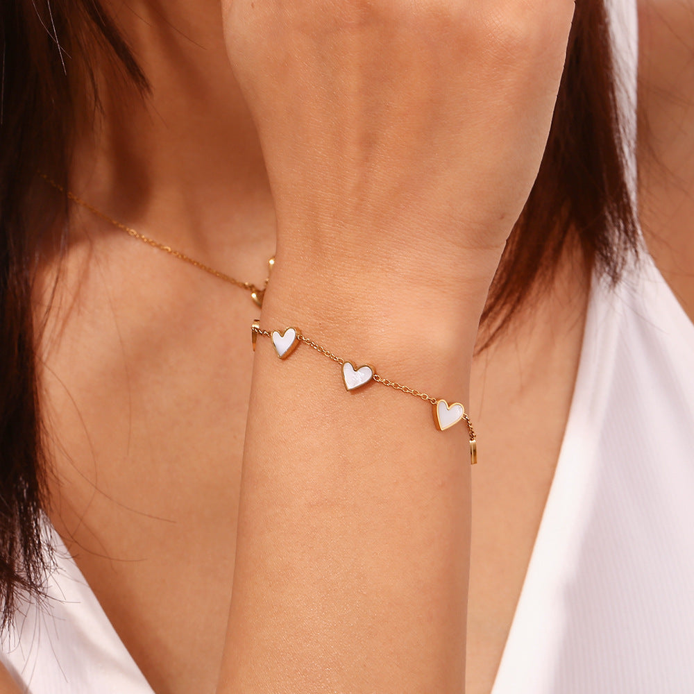 Fashionable Women's Heart-Shaped Stainless Steel Plated 18K Gold White Abalone Bracelet with Geometric Accents
