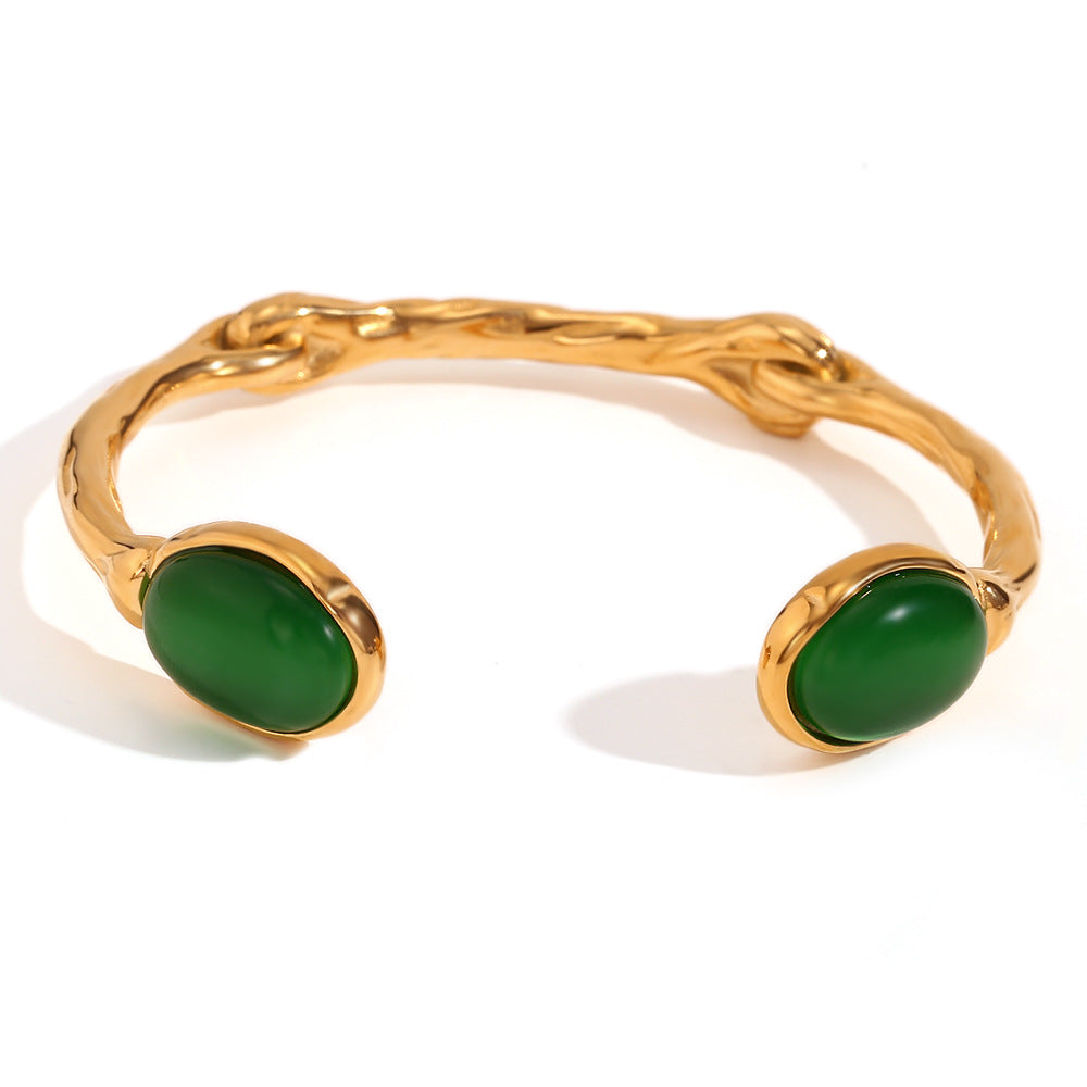 Pulsera de moda de inspiración vintage en acero inoxidable con chapado en oro de 18 quilates, detalles de piedras naturales ovaladas y diseño de brazalete abierto irregular