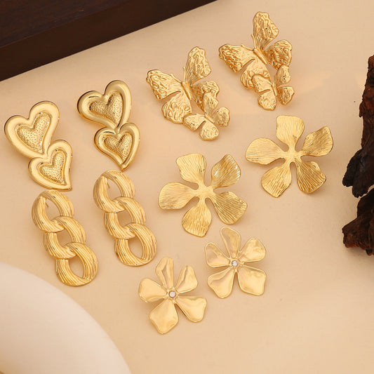 Pendientes de botón chapados de acero inoxidable con diseño de corazón y flor de personalidad