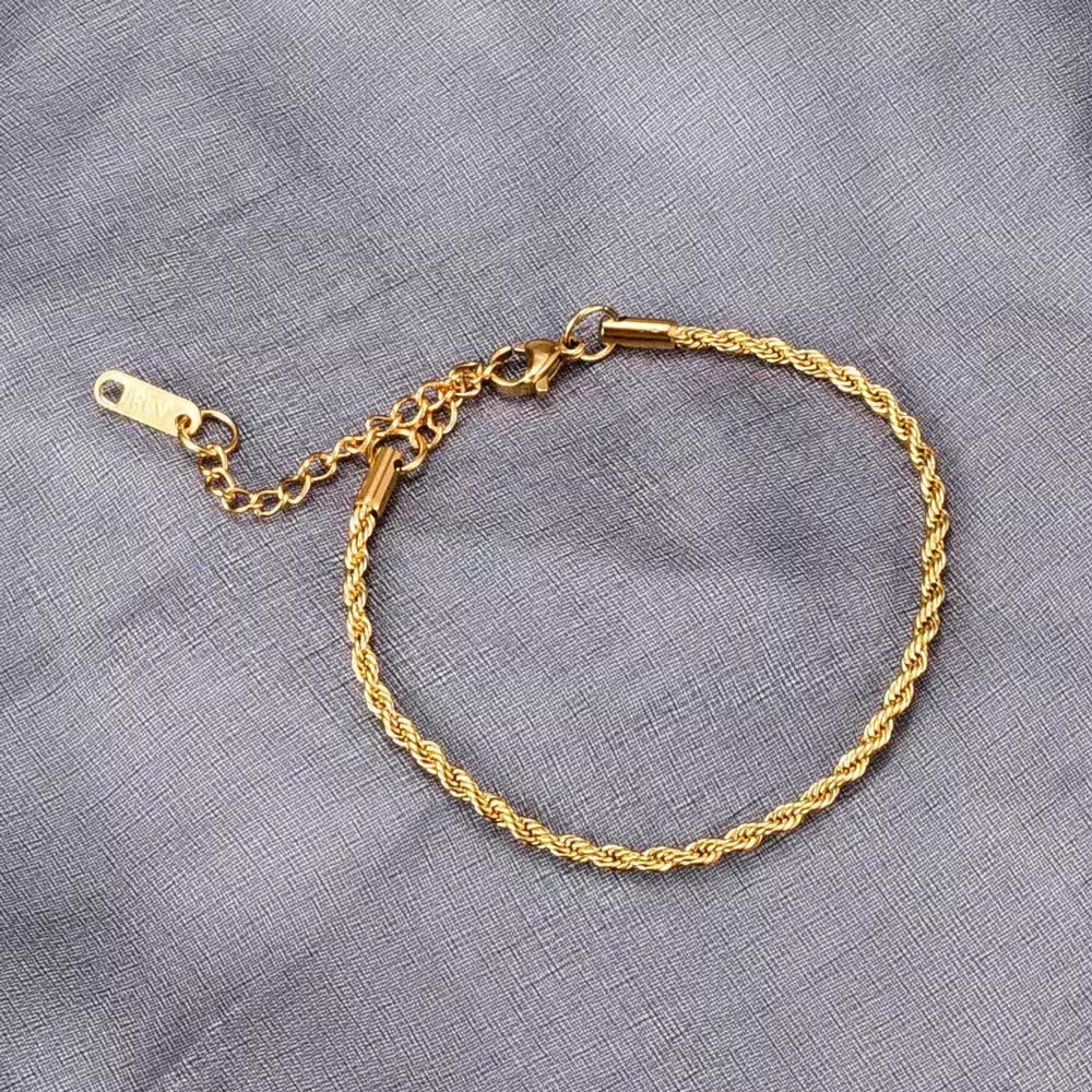 Bracciale da donna a catena a spirale in lega di rame placcato oro 18K con motivo a foglia, dal design originale e minimalista