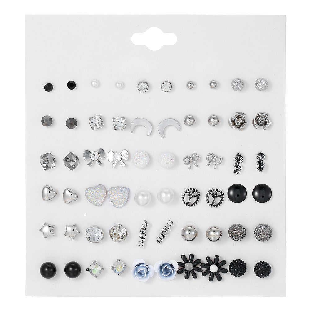 Geometric Asymmetric Micro-inlay Cubic Zirconia and Pearl Titanium Steel Earrings Set with Bow Design