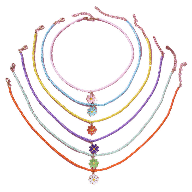 Precioso collar con colgante de lazo en tonos pastel para mujer, con abalorios de cristal y dije de aleación en una delicada cadena