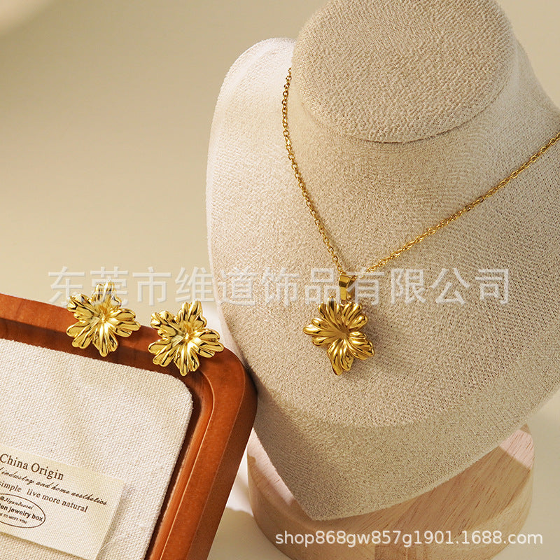 Conjunto de joyas de acero inoxidable con baño de oro minimalista con colgante de corazón floral y lazo en cadena para mujer