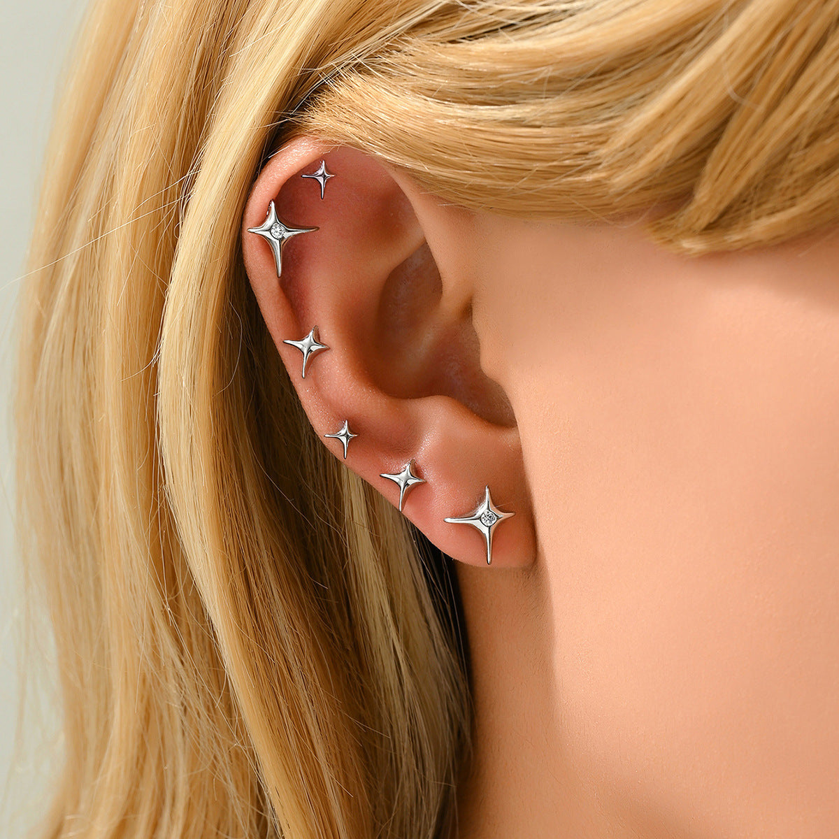 Dulces pendientes minimalistas de cobre en forma de estrella con incrustaciones de circonitas para mujer