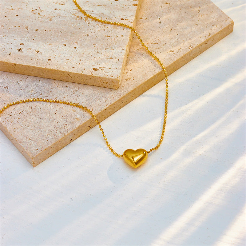 Collana girocollo da donna minimalista con ciondolo irregolare a forma di cuore in acciaio inossidabile con strass intarsiati e catena a serpente lucida