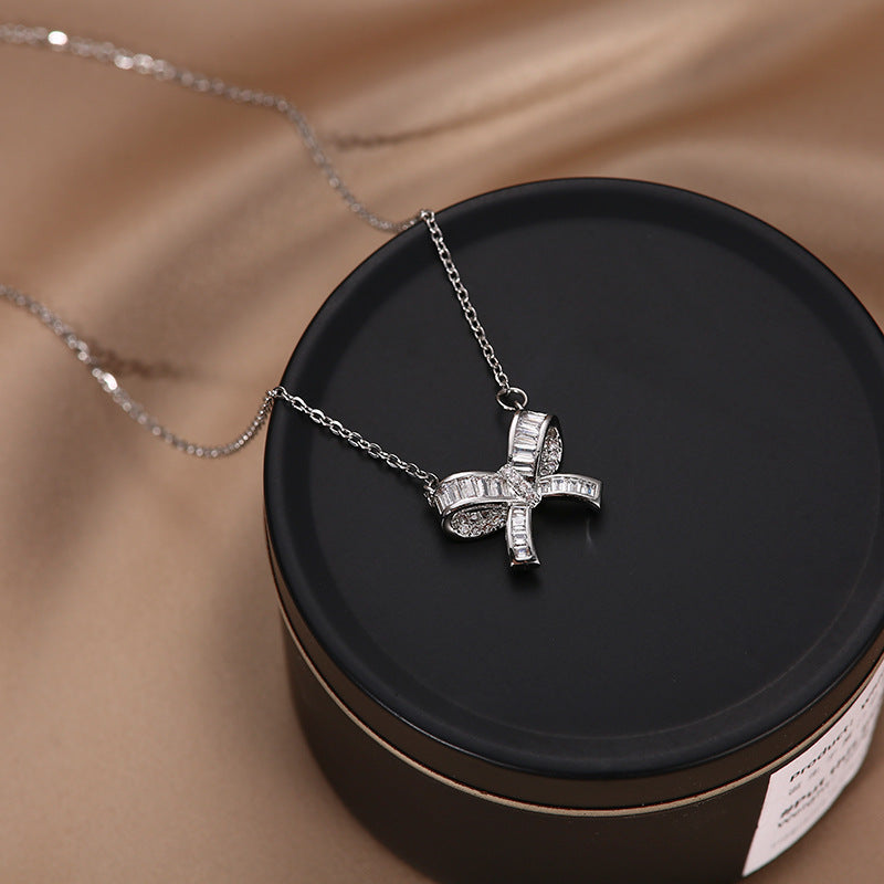 Minimalist Bow-Shaped Titanium Steel Plated Clavicle Necklace with Micro-Pave Zirconia for Women and Men