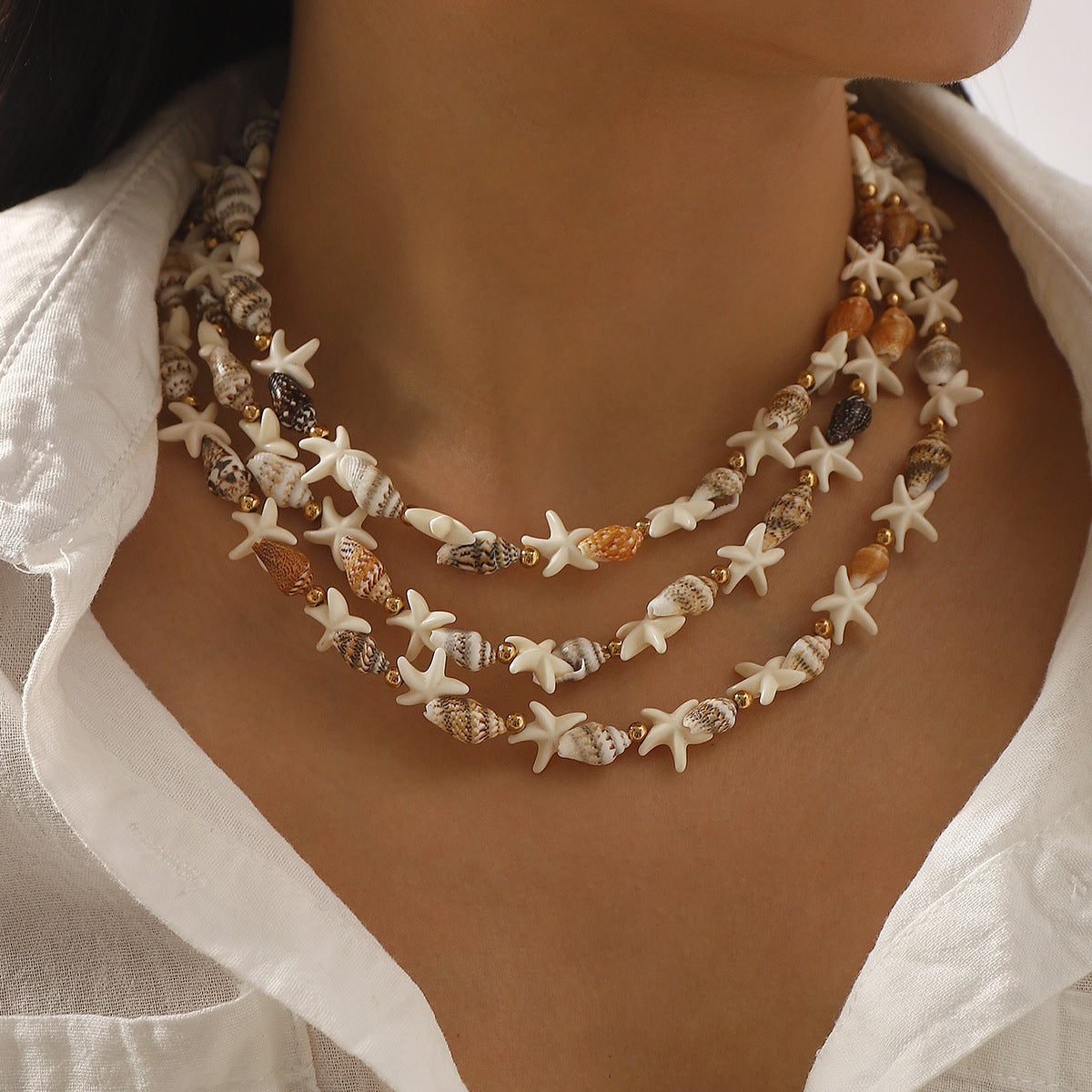Set di collana con conchiglia a stella bohémien e ciondolo a stella da donna con catena in lega e dettagli in resina