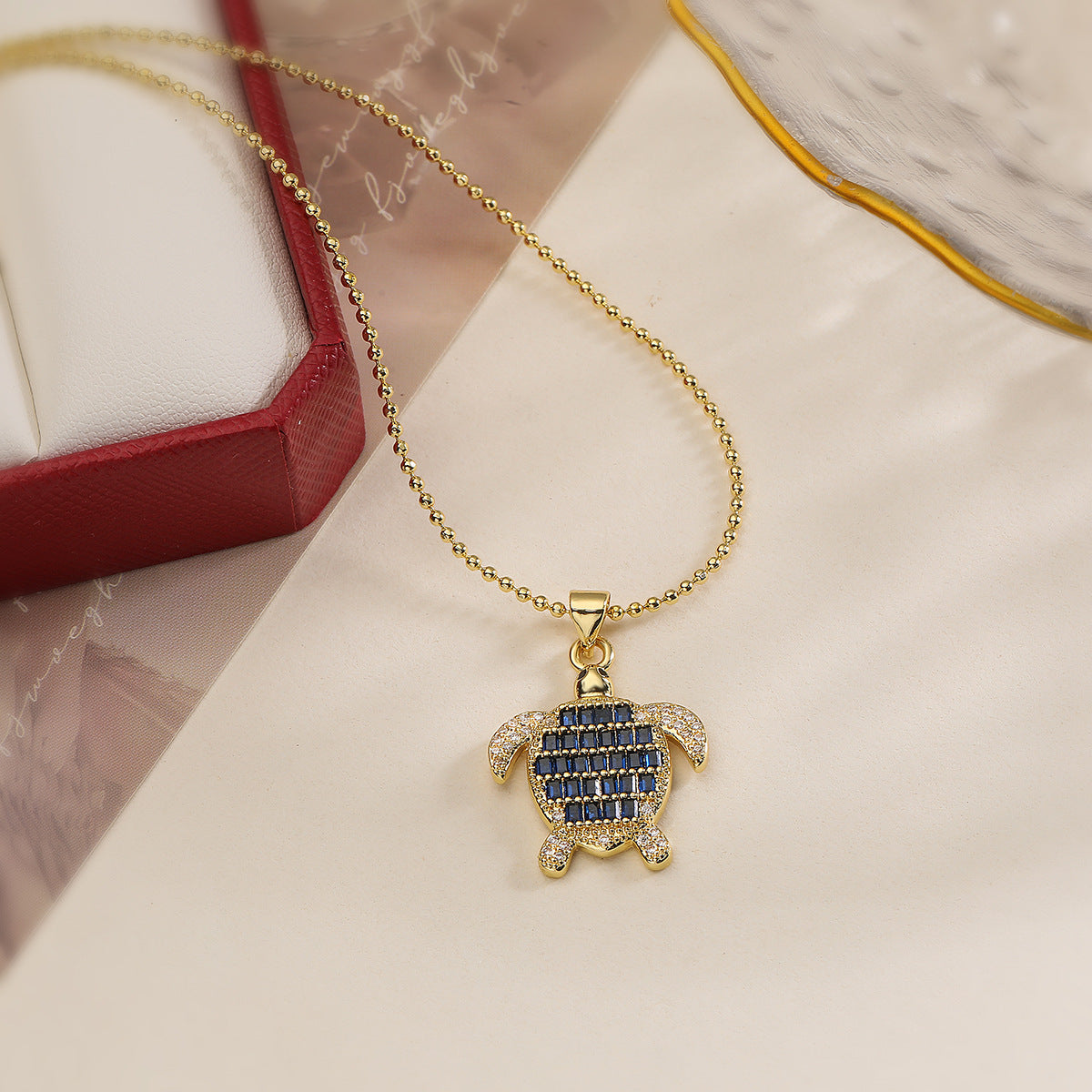 Minimalist Turtle Pendant Necklace for Women with Copper Base Plated in 18K Gold and Zircon Inlay
