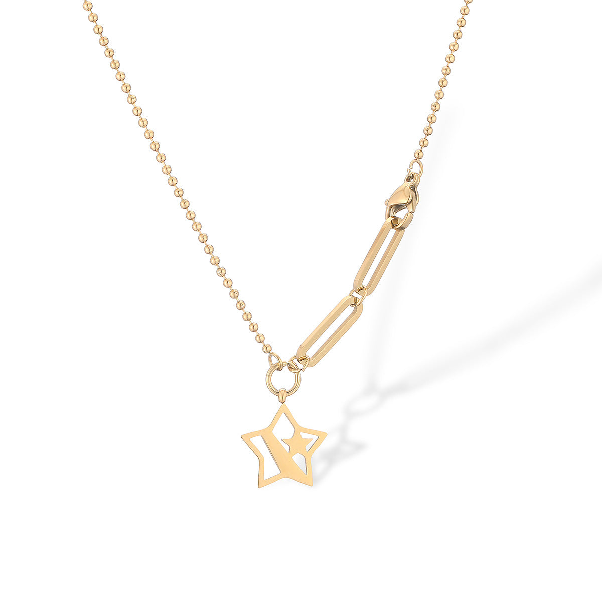 Collana con ciondolo a stella a cinque punte minimalista da donna in acciaio al titanio con placcatura in oro vero