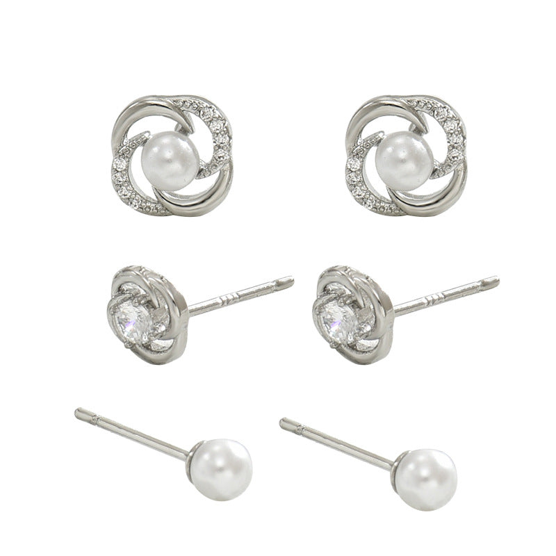 Orecchini da donna geometrici minimalisti con intarsio di zirconi e accenti di perle, design a petalo floreale