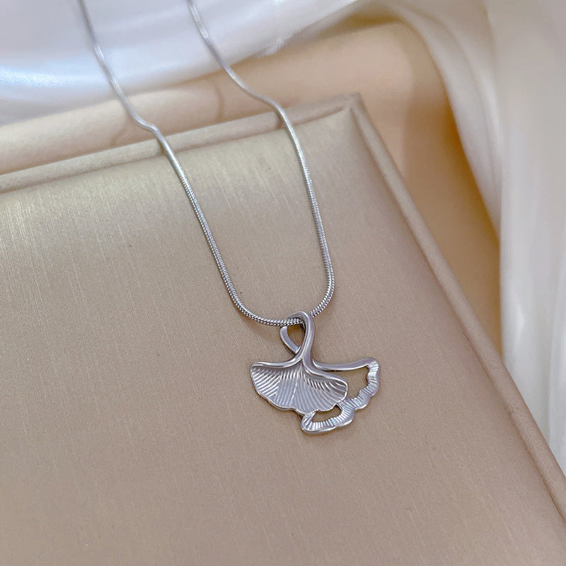 Minimalist Ginkgo Leaf Pendant Necklace in Titanium Steel with Rhinestone Inlay for Women