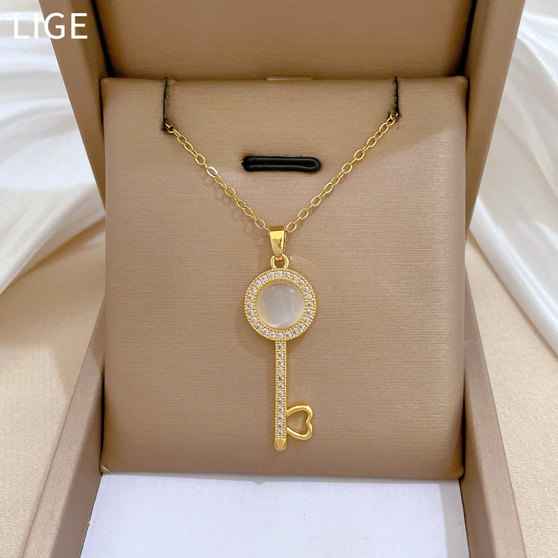 Cartoon Style Cat's Eye Key Pendant Necklace for Women Stainless Steel Clavicle Chain with Full Rhinestone Accents
