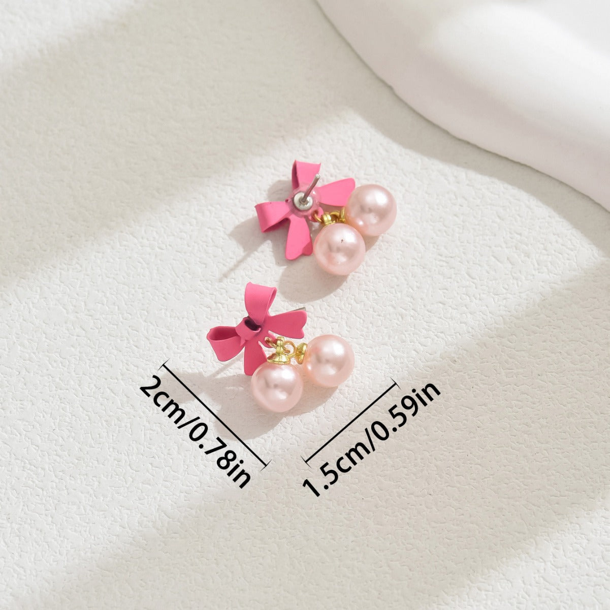 Pendientes de aleación con forma de lazo minimalista y perla incrustada para mujer, joyería de oreja rosa dulce y fresca
