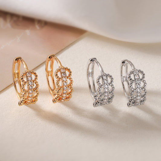 Pendientes minimalistas de cobre geométricos calados con baño de oro de 18 quilates y detalles de circonita para mujer