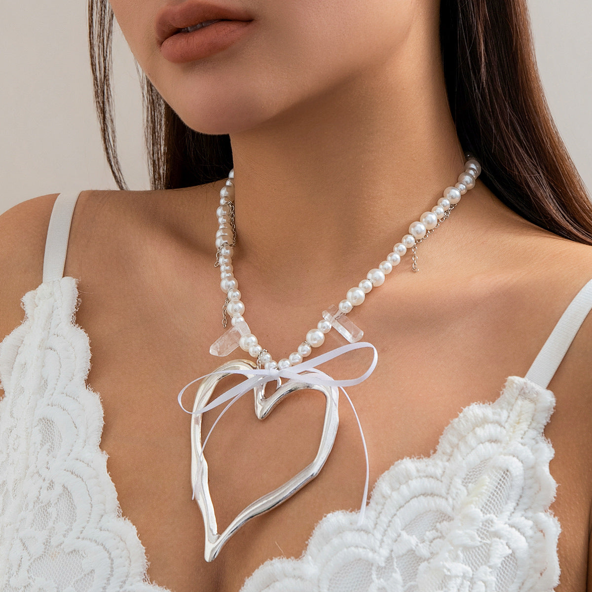 Collana da donna con ciondolo a cuore e fiocco in lega galvanizzata stile Ins
