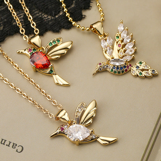 Collana con pendente in rame a forma di uccello minimalista con intarsio di zirconi per donna