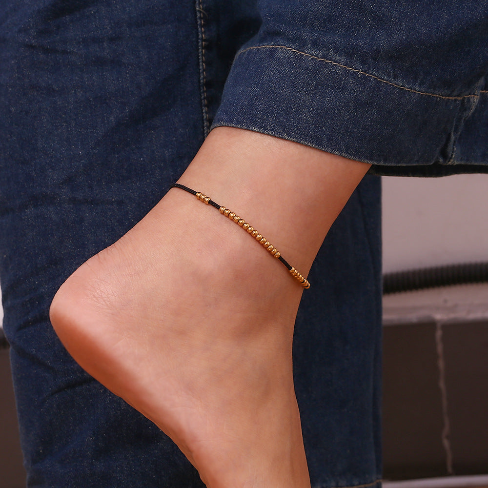 Minimalist Geometric Stainless Steel Anklet with 18K Gold Plating and Black Cord Accented with 25 Steel Beads