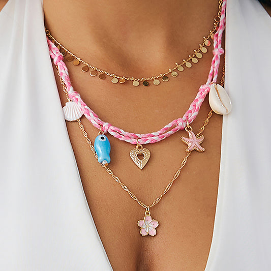 Collar minimalista con colgante de estrella y motivos florales con cadena de aleación chapada en oro para mujer