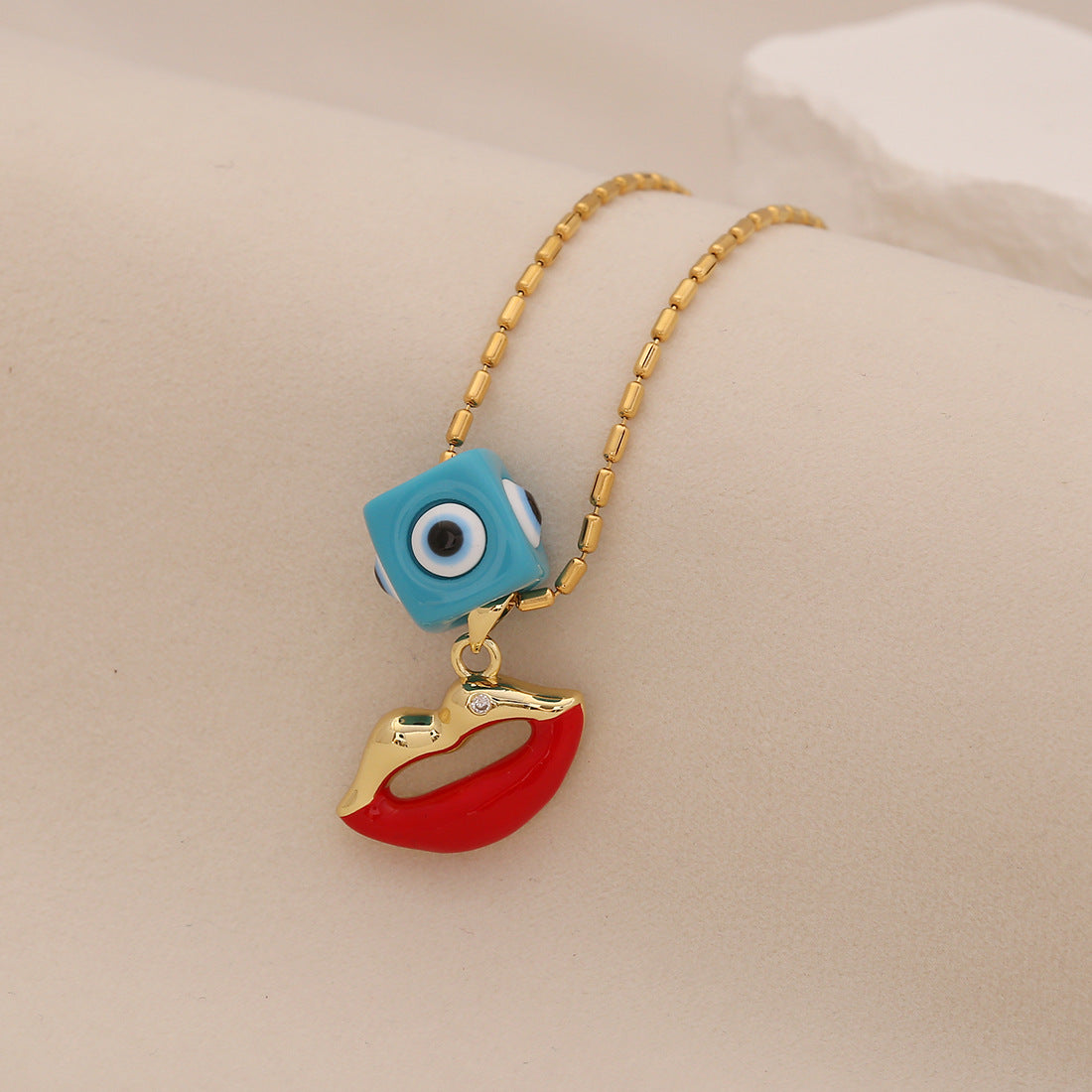 Edgy Eye and Lips Pendant Necklace in Titanium Steel with Plated Finish on Snake Chain for Women