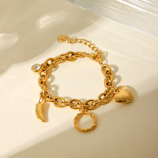 Pulsera minimalista de circonita en forma de corazón de acero inoxidable para mujer con cadena de acero de titanio chapada en oro